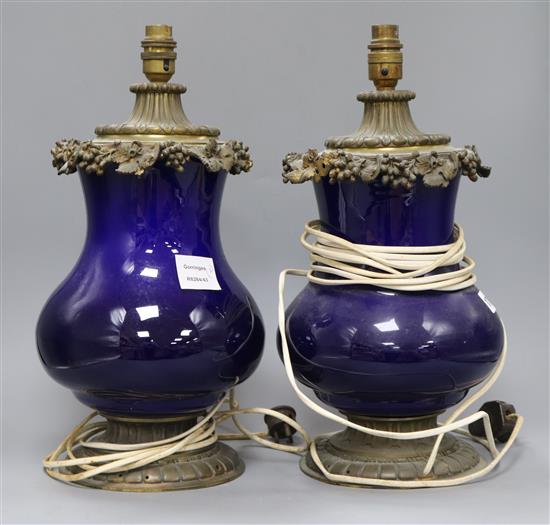A pair of Louis XV style gilt metal mounted dark blue ceramic table lamps height 40cm